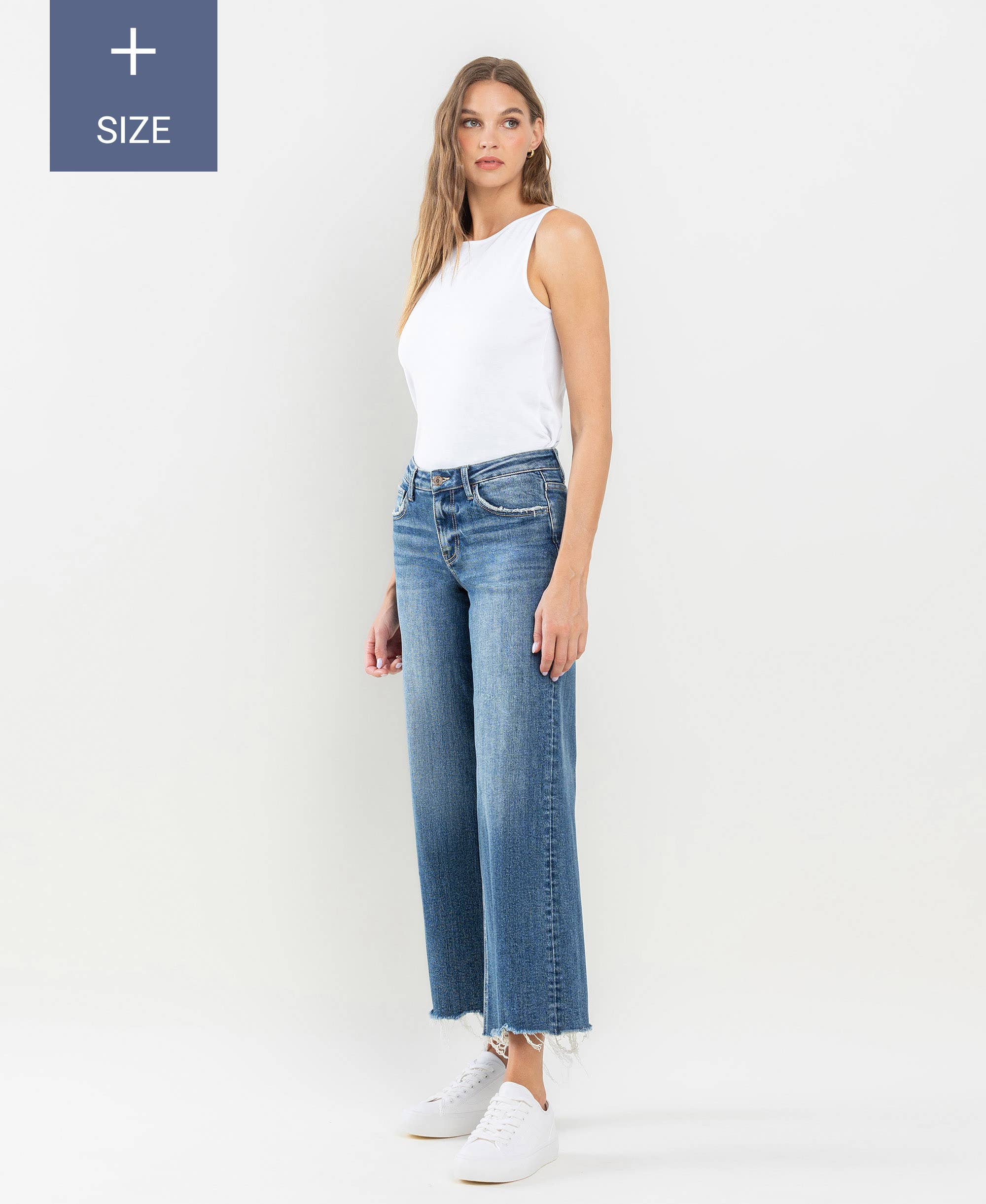 PLUS SIZE MID RISE RAW HEM WIDE LEG JEANS