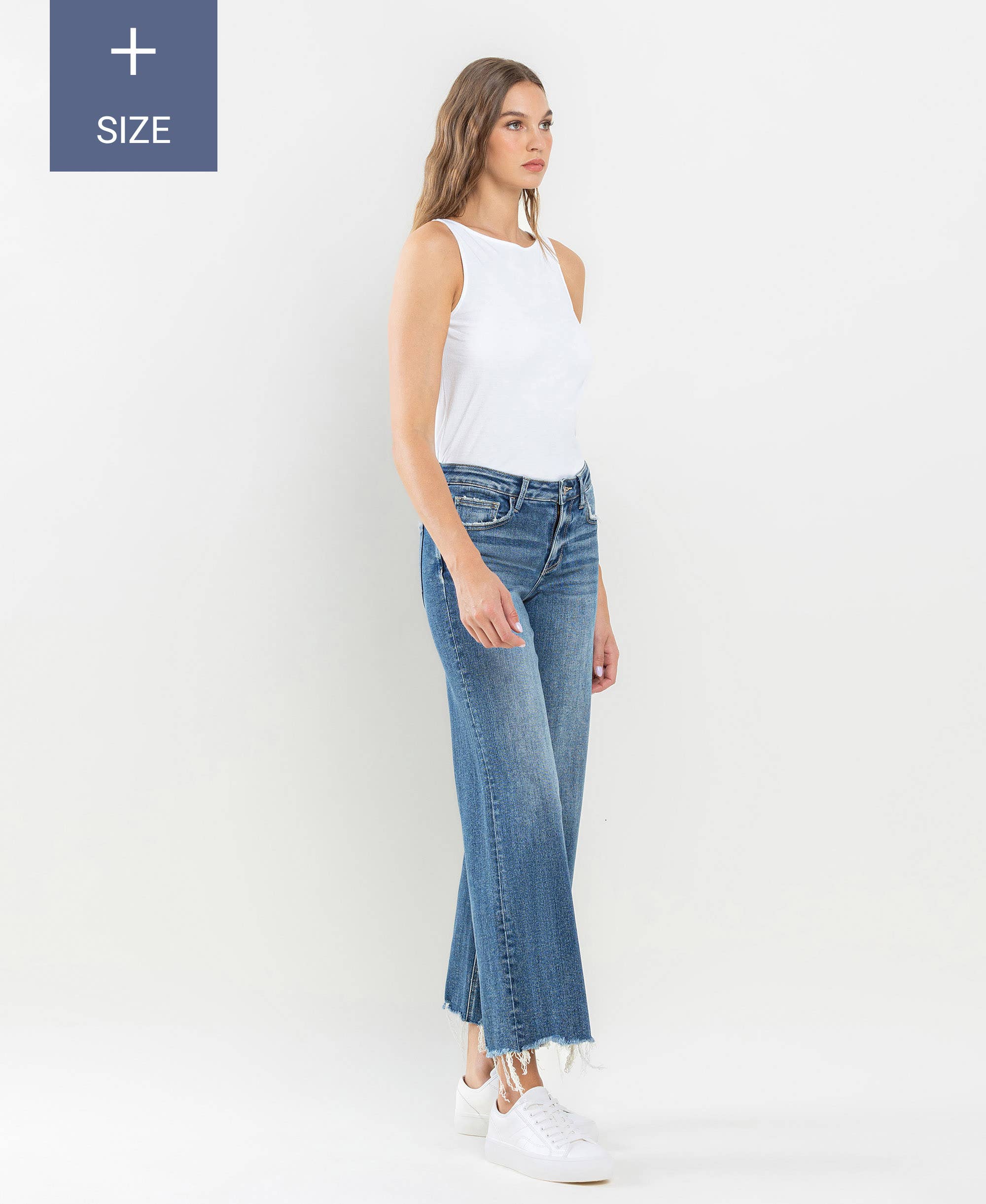 PLUS SIZE MID RISE RAW HEM WIDE LEG JEANS