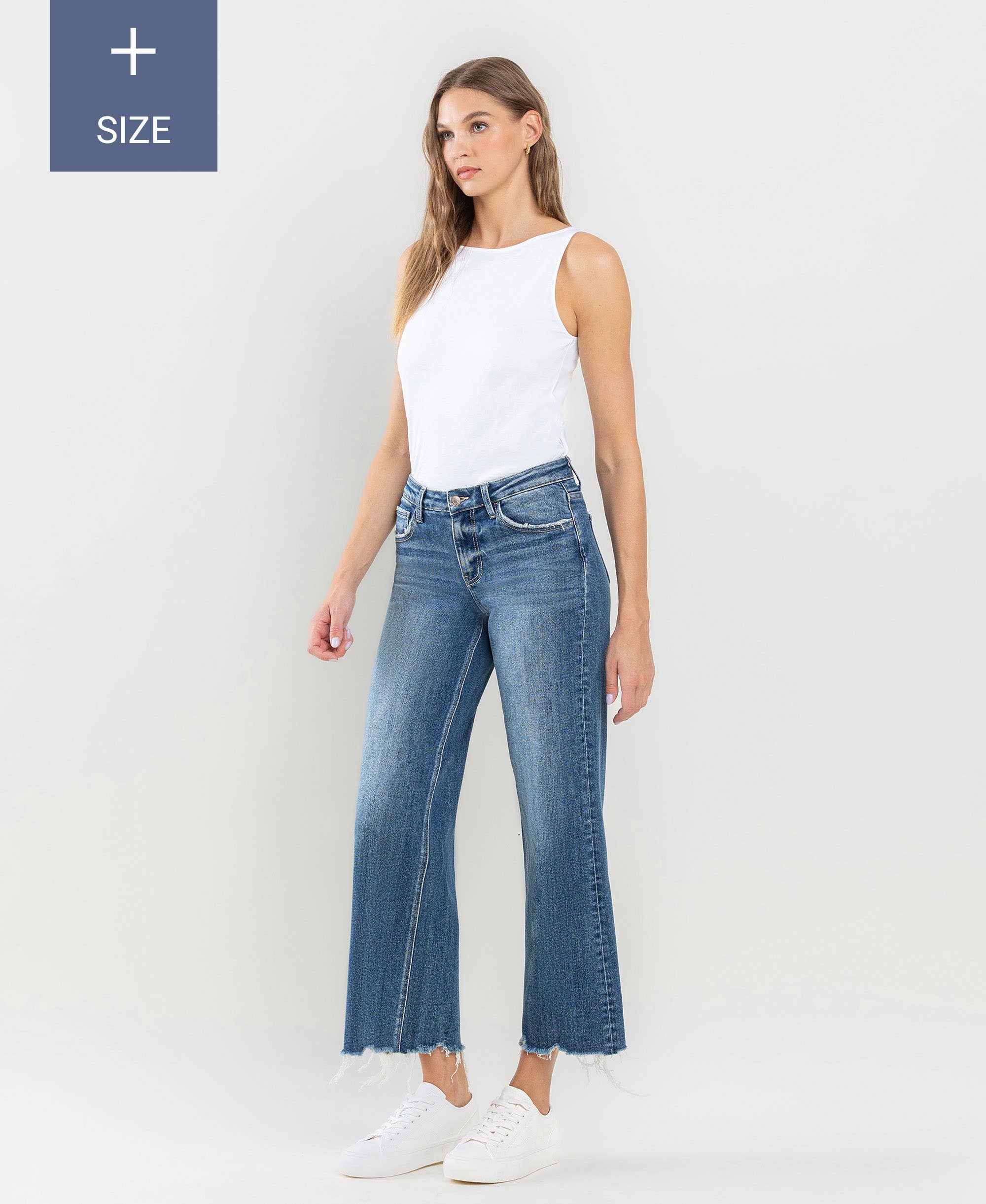 PLUS SIZE MID RISE RAW HEM WIDE LEG JEANS