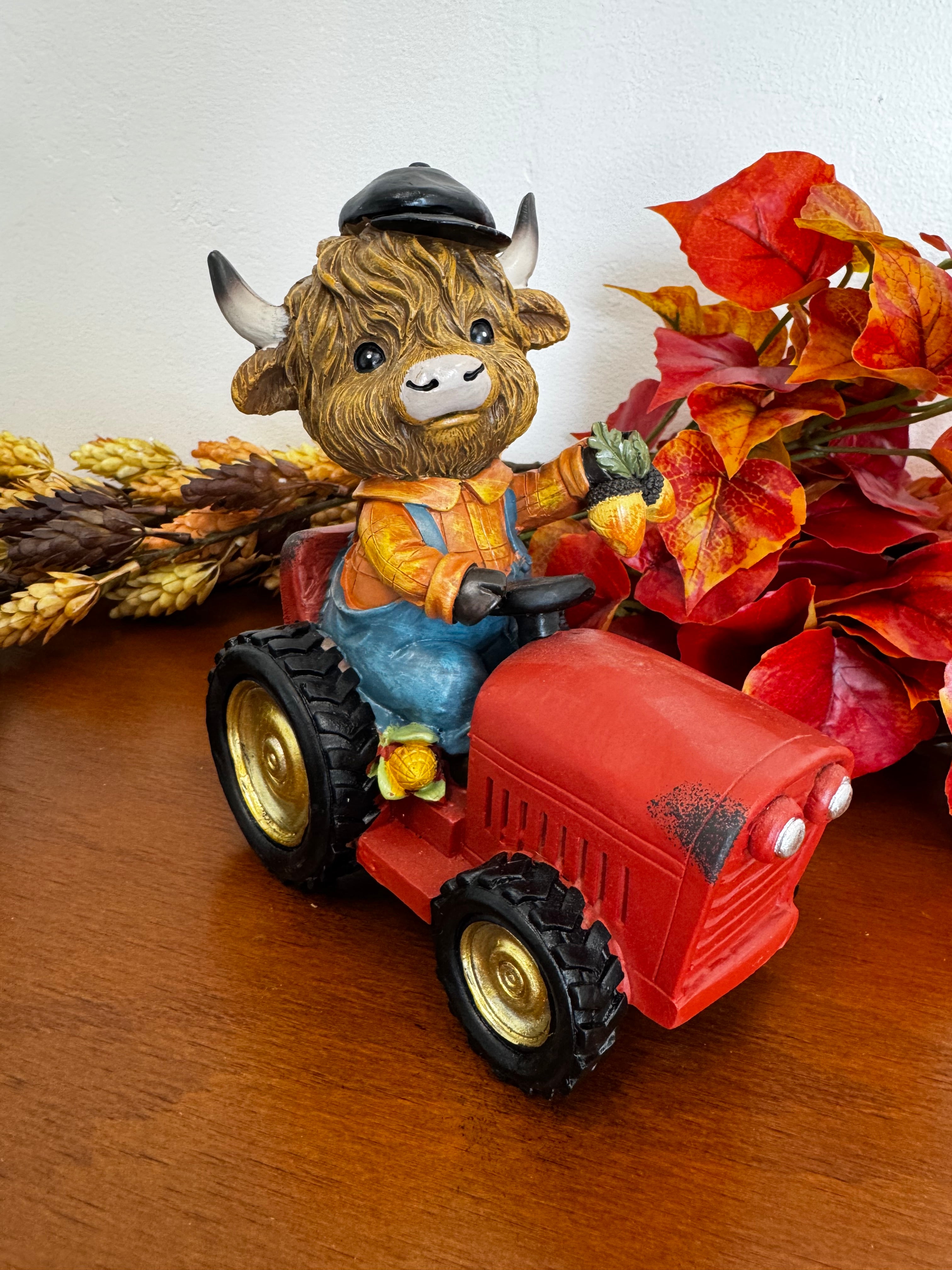 Resin Harvest Highland Cow on Tractor Figurine