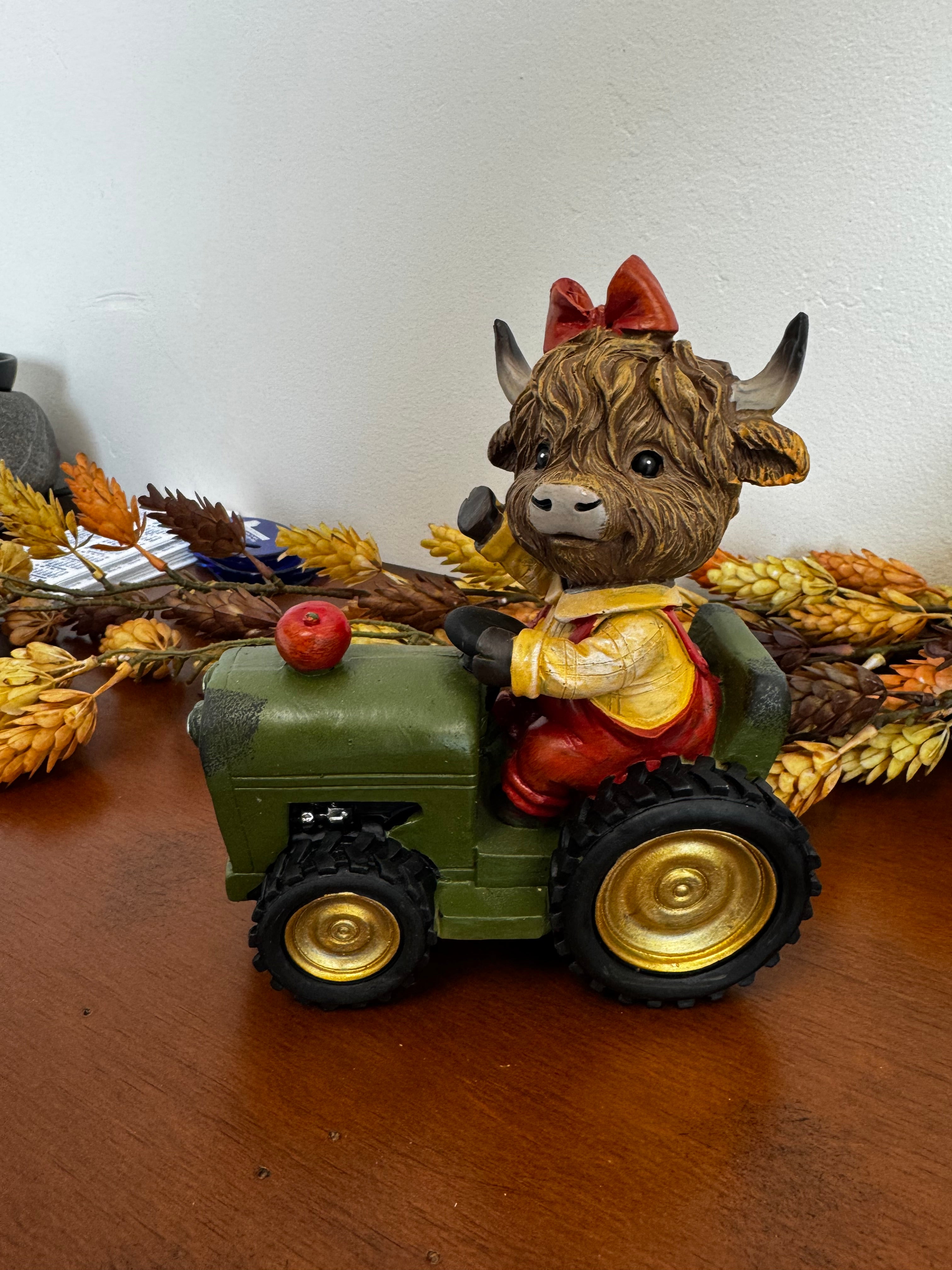 Resin Harvest Highland Cow on Tractor Figurine