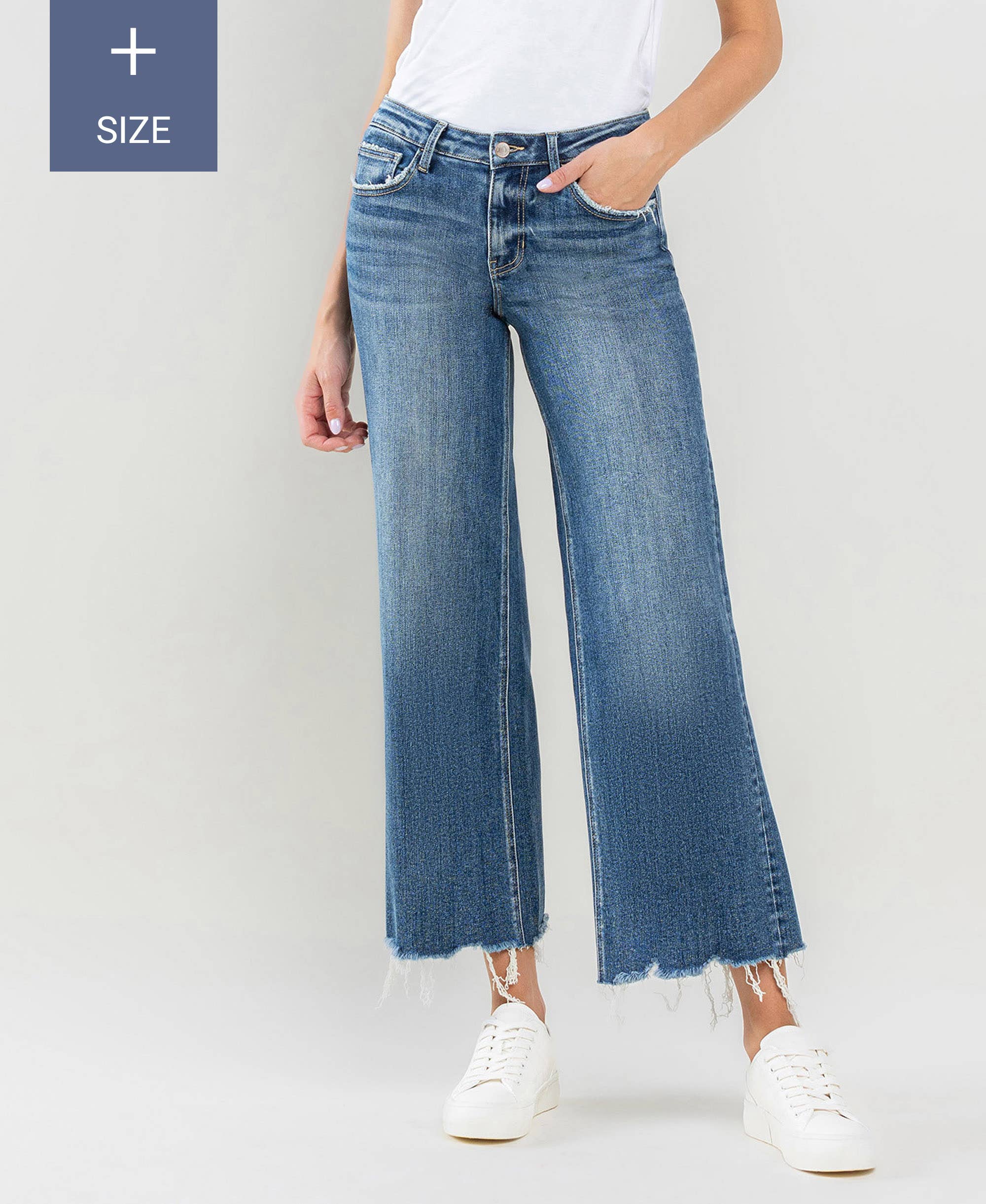 PLUS SIZE MID RISE RAW HEM WIDE LEG JEANS