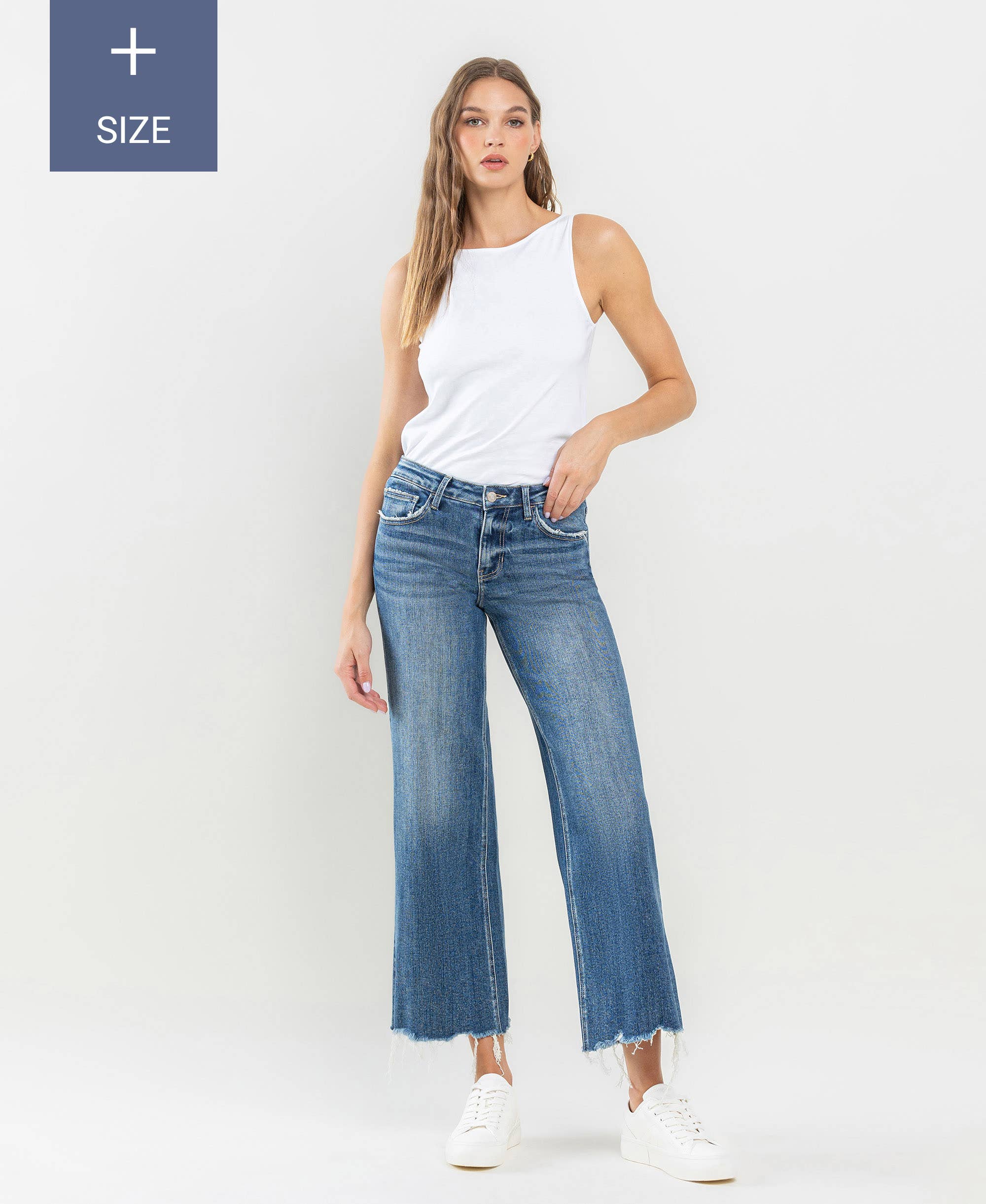 PLUS SIZE MID RISE RAW HEM WIDE LEG JEANS