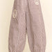 Davi & Dani Peace Sign Pinstripe Wide-Leg Palazzo Pant | Burgundy | Plus Size - The Bronze Butterfly