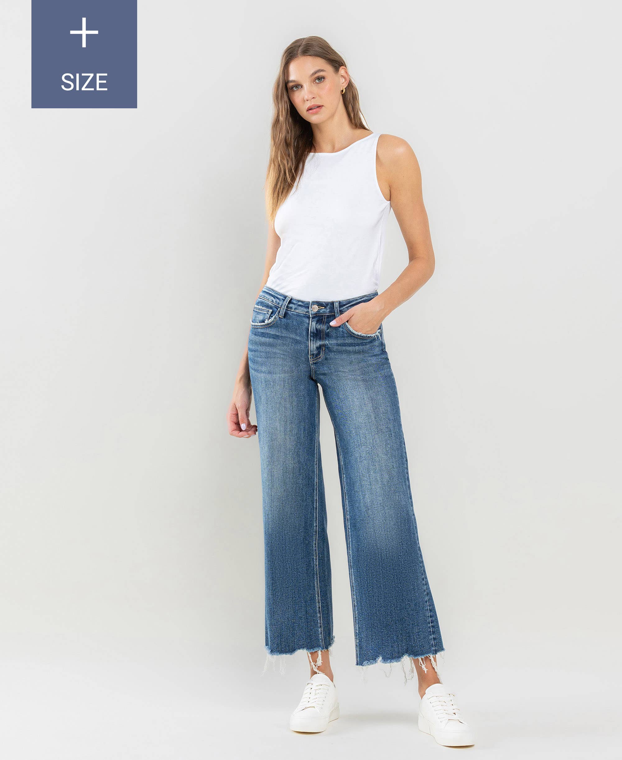 PLUS SIZE MID RISE RAW HEM WIDE LEG JEANS