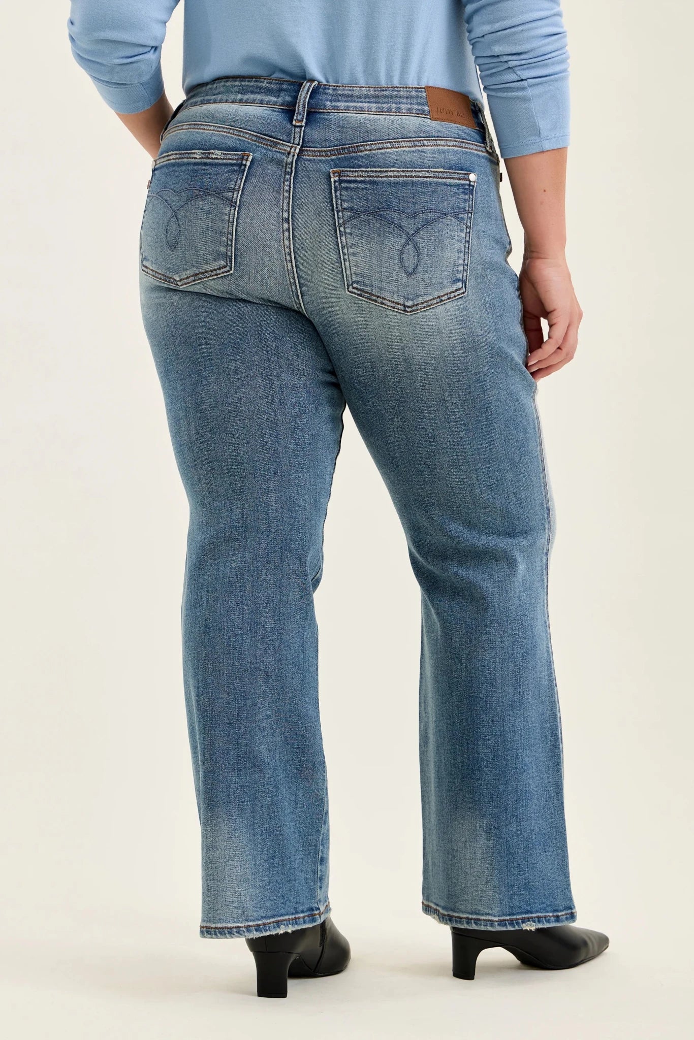 Judy Blue Low Rise Bootcut Jeans Plus Size | Genie Blue Wash | The Bronze Butterfly - The Bronze Butterfly