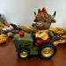 Resin Harvest Highland Cow on Tractor Figurine - The Bronze Butterfly